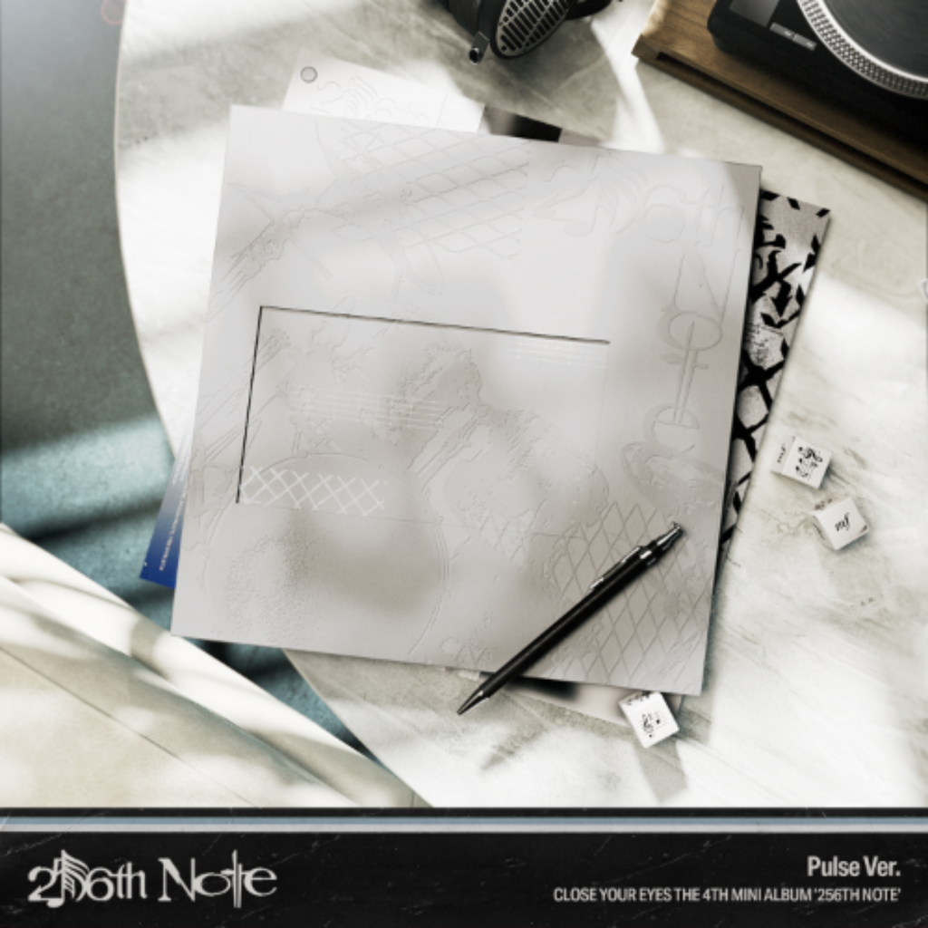 A square album cover or print for Bath Note's 'Pulse Ver.' is displayed on a marble-patterned surface, with a black pen resting on it.